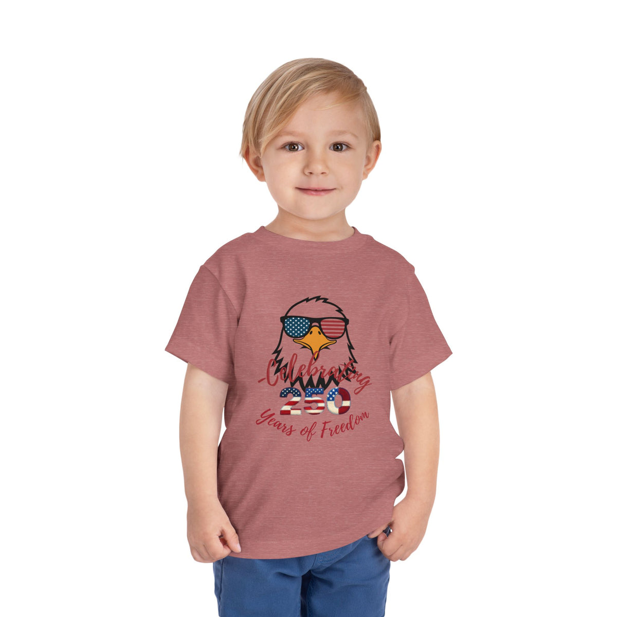 Celebrate America's 250th birthday in style! This soft Bella Canvas toddler tee features a patriotic eagle in American-flag sunglasses. Perfect for 4th of July parades, cookouts & fireworks. Sizes 2T–5T. Heather Mauve