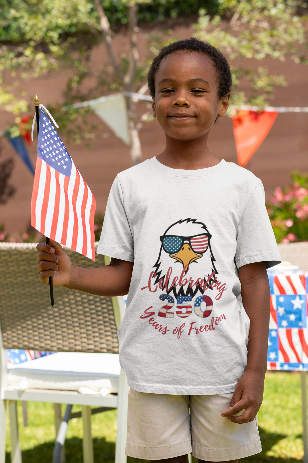 Celebrate America's 250th birthday in style! This soft Bella Canvas toddler tee features a patriotic eagle in American-flag sunglasses. Perfect for 4th of July parades, cookouts & fireworks. Sizes 2T–5T.