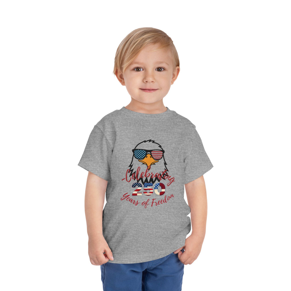 Celebrate America's 250th birthday in style! This soft Bella Canvas toddler tee features a patriotic eagle in American-flag sunglasses. Perfect for 4th of July parades, cookouts & fireworks. Sizes 2T–5T. Athletic Heather 