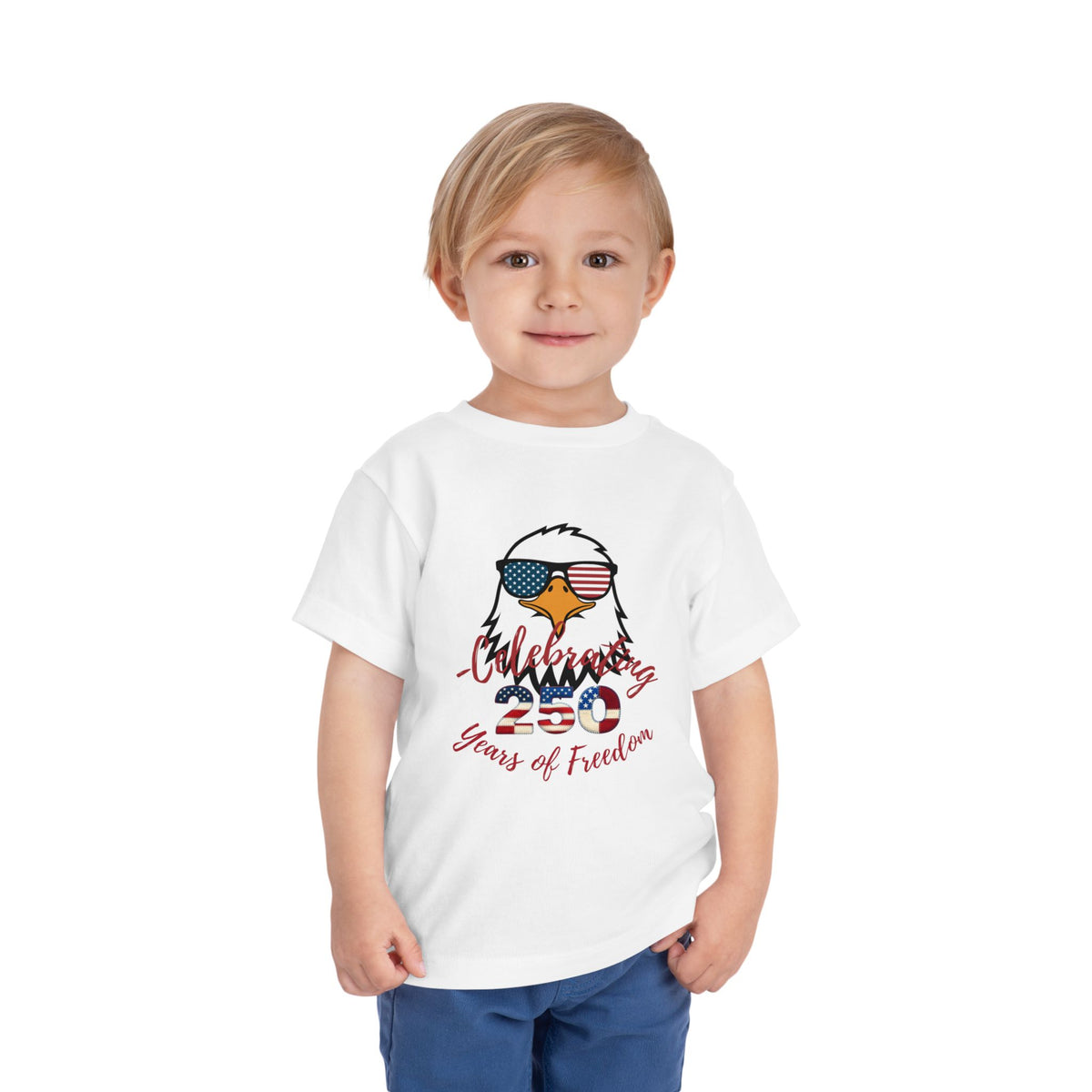 Celebrate America's 250th birthday in style! This soft Bella Canvas toddler tee features a patriotic eagle in American-flag sunglasses. Perfect for 4th of July parades, cookouts & fireworks. Sizes 2T–5T. White