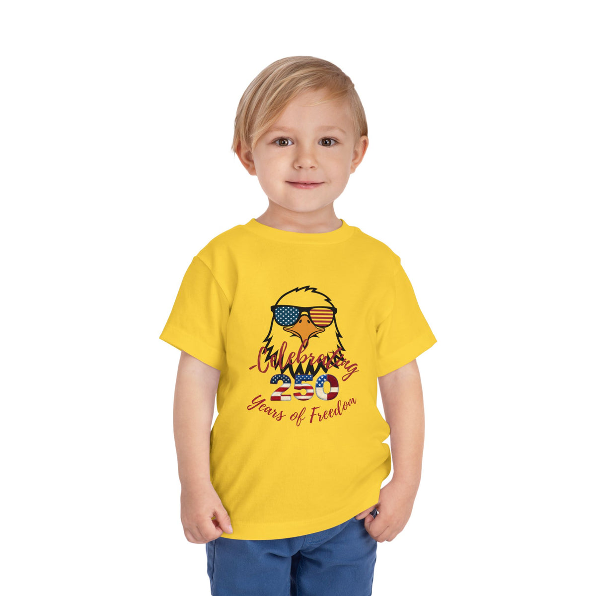 Celebrate America's 250th birthday in style! This soft Bella Canvas toddler tee features a patriotic eagle in American-flag sunglasses. Perfect for 4th of July parades, cookouts & fireworks. Sizes 2T–5T. Yellow