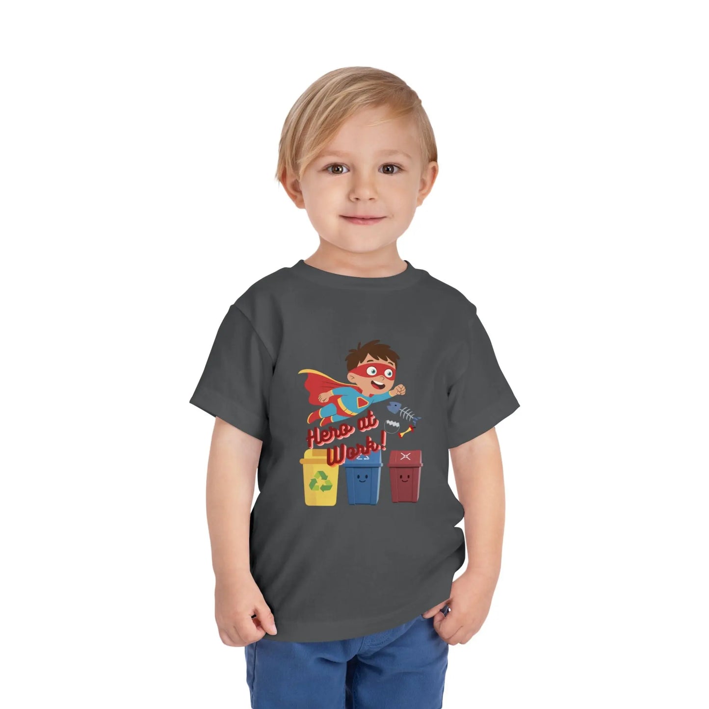 Toddler wearing these inspiring little eco-heroes with this playful toddler recycling shirt. Soft, durable cotton tee featuring a caped superhero sorting bin. Perfect for Earth Day, preschool, and everyday adventures. Asphalt