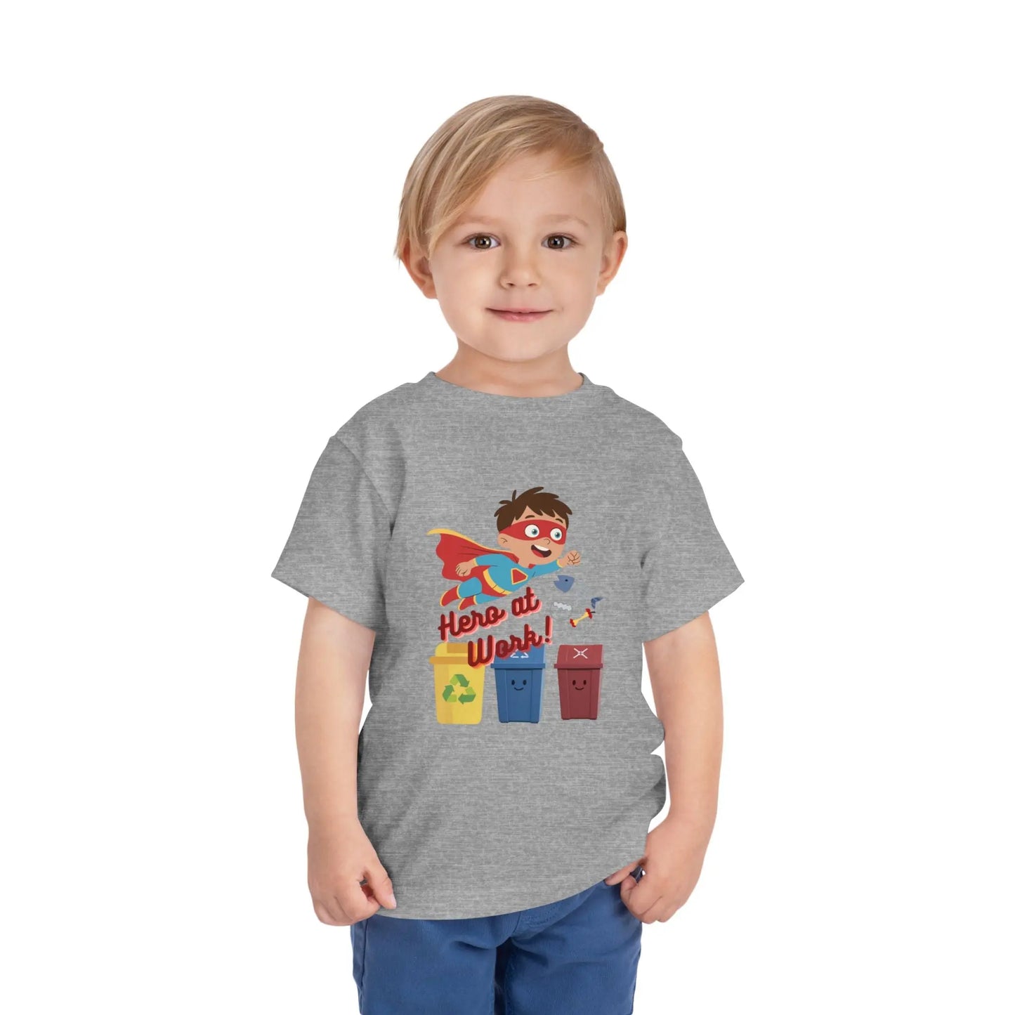 Toddler wearing these inspiring little eco-heroes with this playful toddler recycling shirt. Soft, durable cotton tee featuring a caped superhero sorting bin. Perfect for Earth Day, preschool, and everyday adventures. Athletic Heather