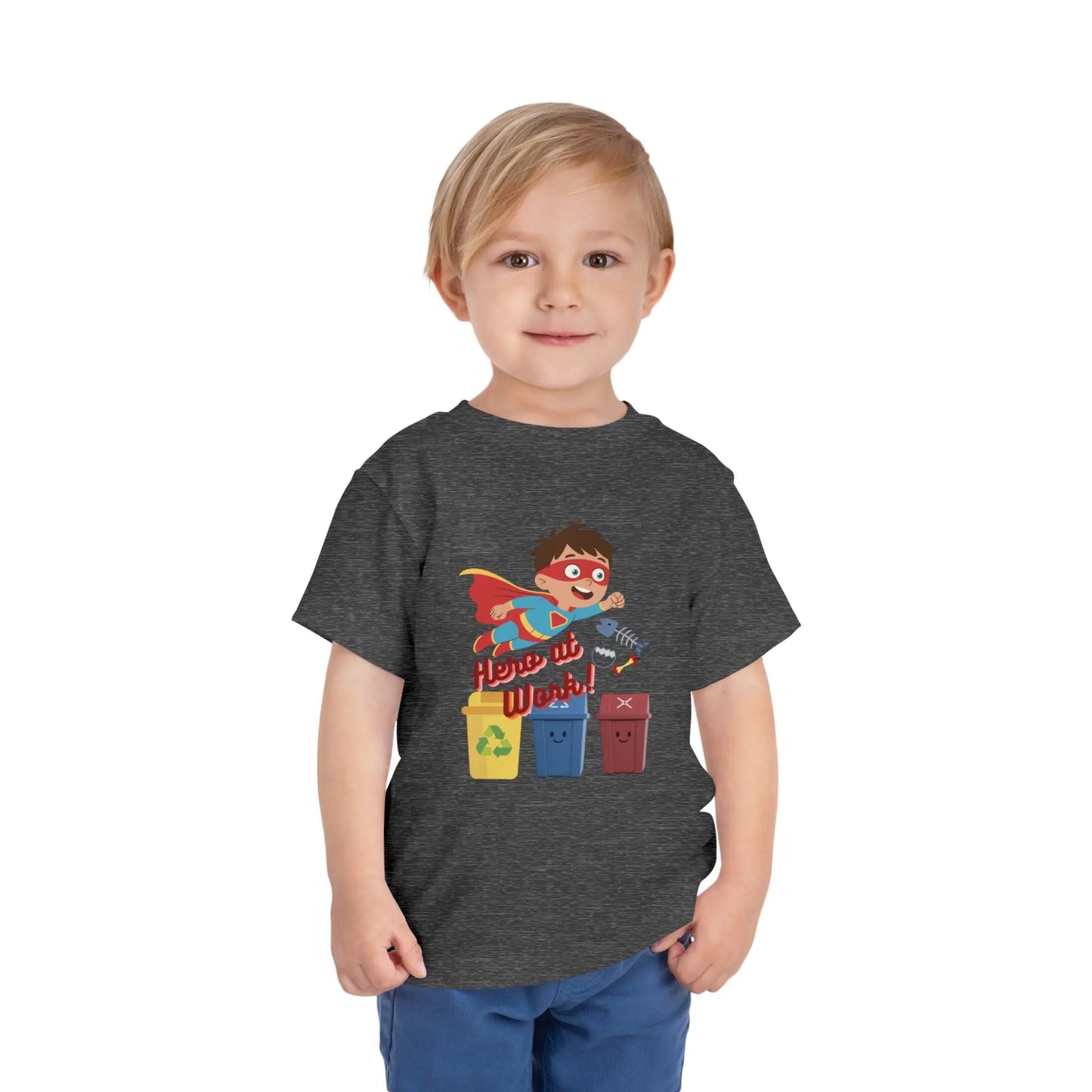 Toddler wearing these inspiring little eco-heroes with this playful toddler recycling shirt. Soft, durable cotton tee featuring a caped superhero sorting bin. Perfect for Earth Day, preschool, and everyday adventures. Deep Heather