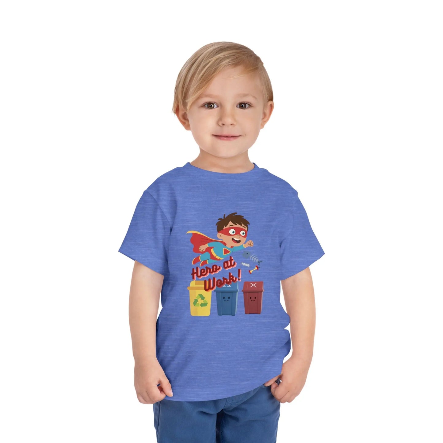 Toddler wearing these inspiring little eco-heroes with this playful toddler recycling shirt. Soft, durable cotton tee featuring a caped superhero sorting bin. Perfect for Earth Day, preschool, and everyday adventures. Heather Columbia Blue
