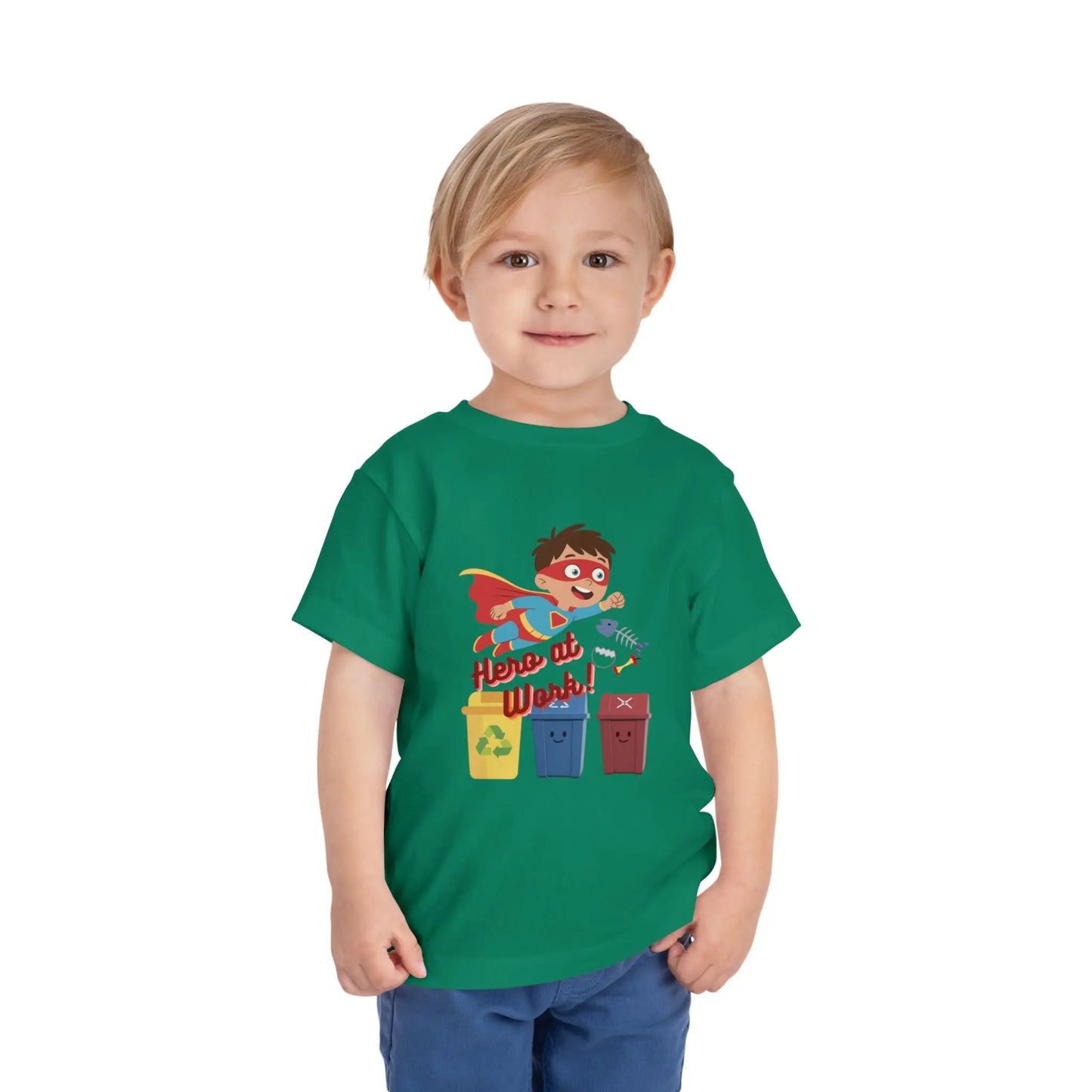 Toddler wearing these inspiring little eco-heroes with this playful toddler recycling shirt. Soft, durable cotton tee featuring a caped superhero sorting bin. Perfect for Earth Day, preschool, and everyday adventures. Kelly Green