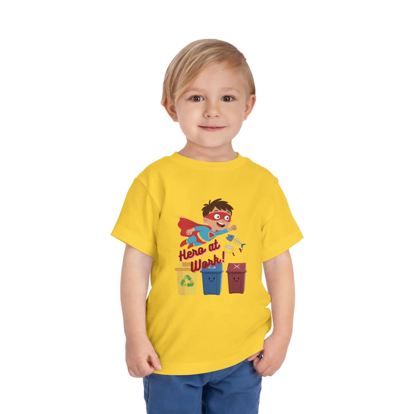 Toddler wearing these inspiring little eco-heroes with this playful toddler recycling shirt. Soft, durable cotton tee featuring a caped superhero sorting bin. Perfect for Earth Day, preschool, and everyday adventures. Yellow