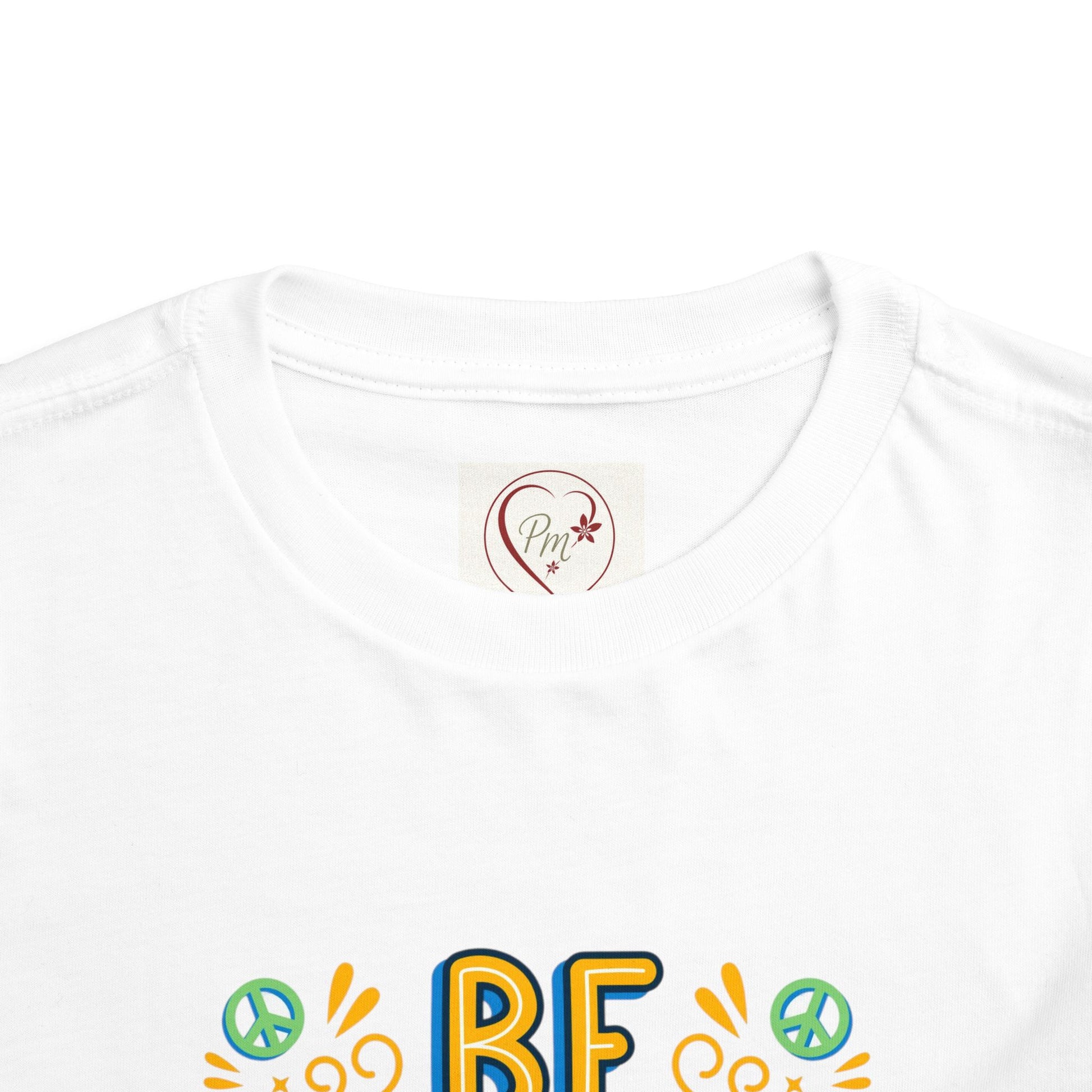 White t-shirt with colorful text and PM Creations 25 logo on a white background