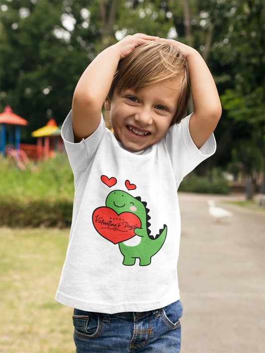 Toddler wearing tee with cute dinosaur holding a heart, White