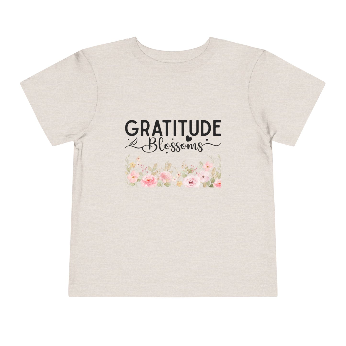 Soft cotton toddler tee with Gratitude Blooms text and watercolor florals. Perfect for church, spring celebrations, and faith-based wear. Sizes 2T-5T. Heather Dust
