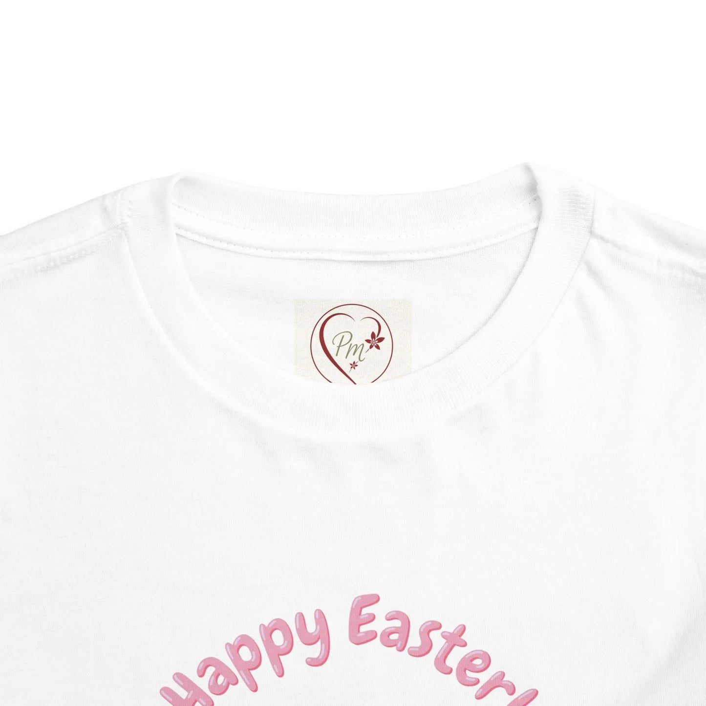 White t-shirt with 'Happy Easter!' text and a PM Creations 25 logo on a white background