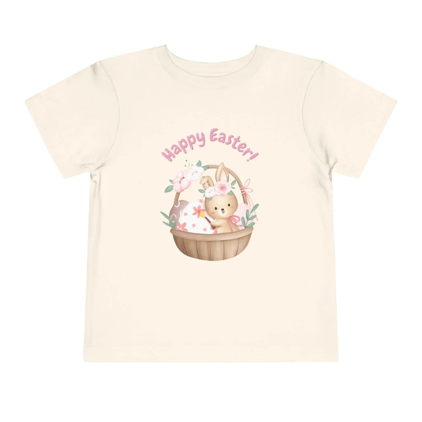 Soft cotton toddler tee with bunny in blossom-lined basket and Happy Easter rainbow lettering. Perfect for egg hunts and spring photos. Sizes 2T-5T. Natural