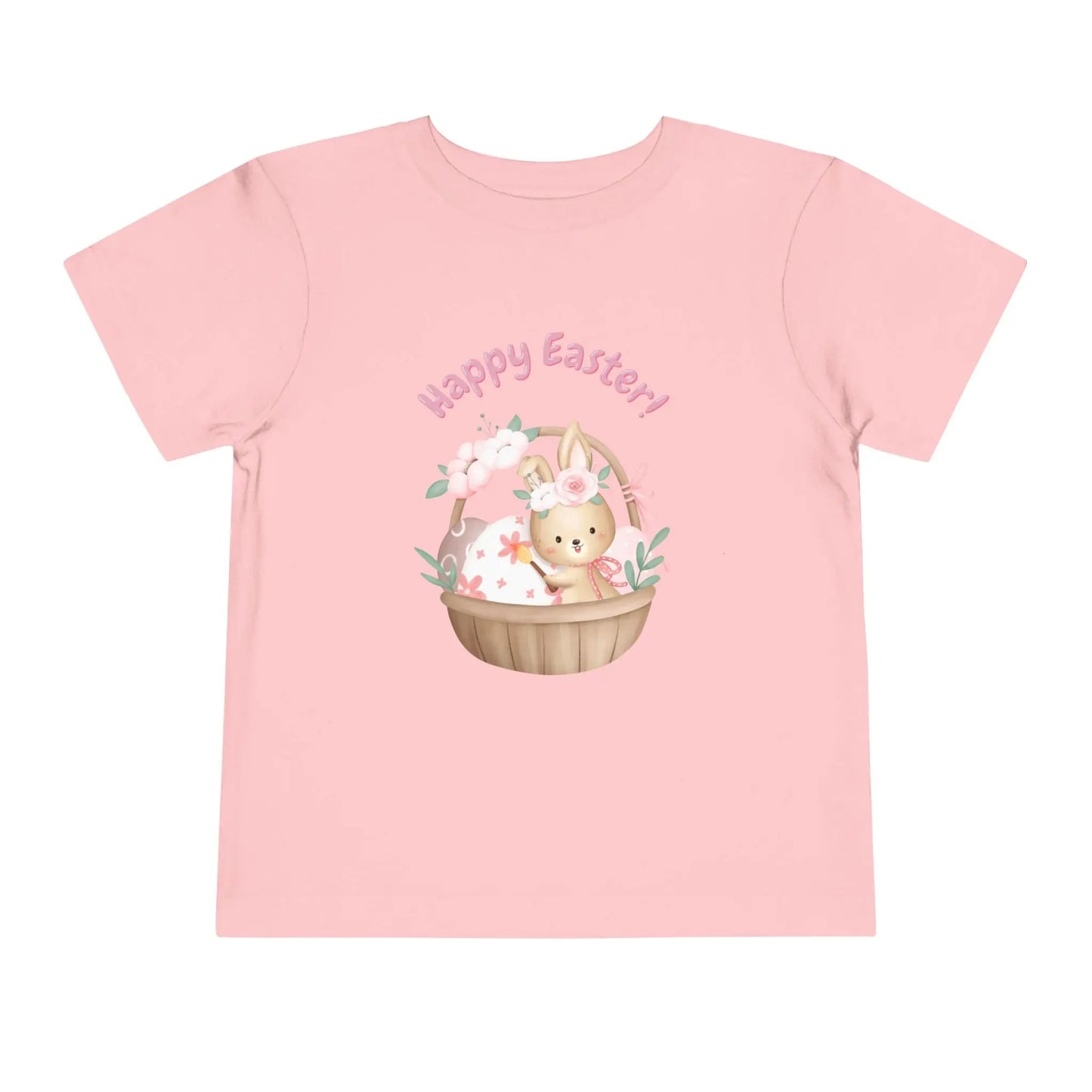 Soft cotton toddler tee with bunny in blossom-lined basket and Happy Easter rainbow lettering. Perfect for egg hunts and spring photos. Sizes 2T-5T. Pink