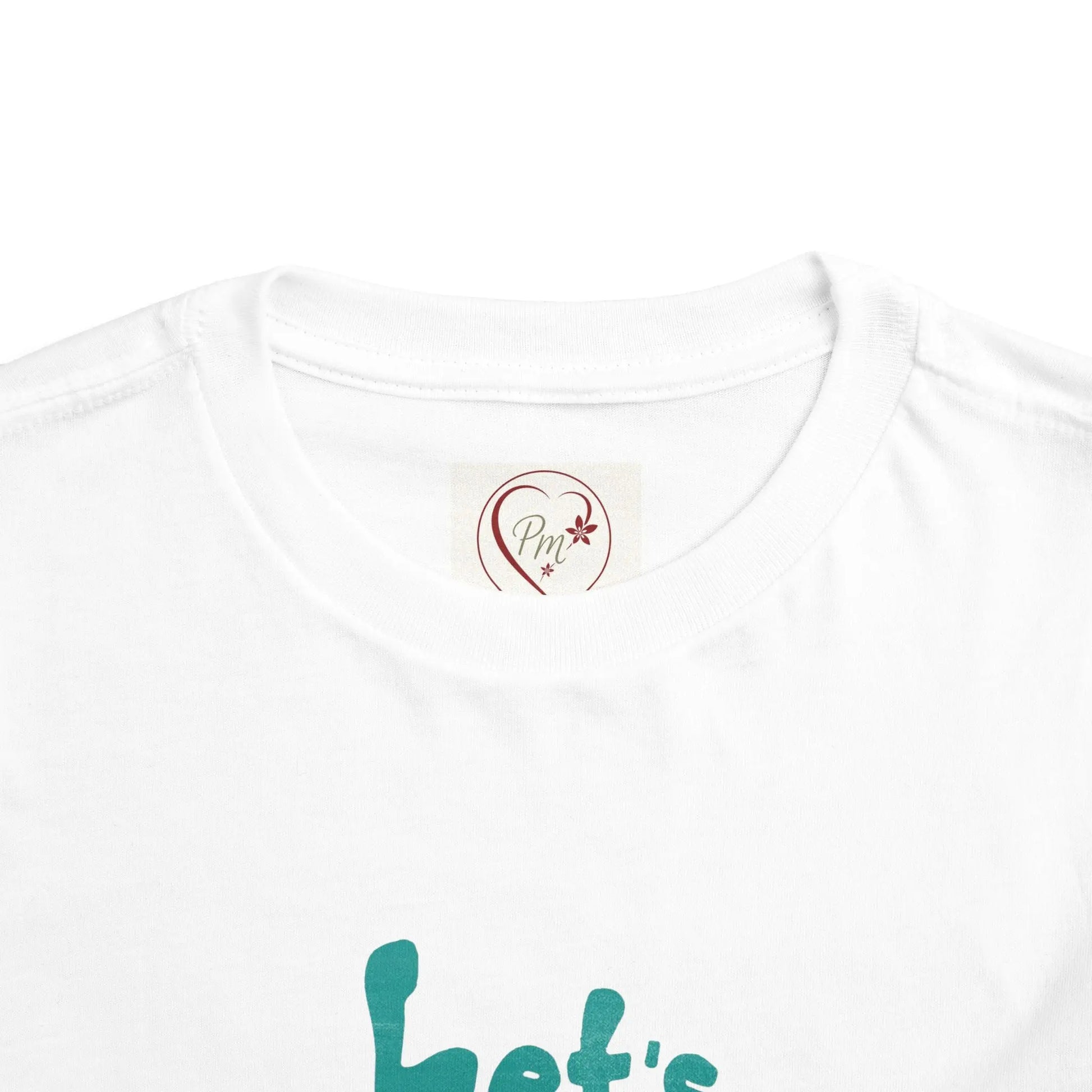 White t-shirt with a PM Creations 25 logo and text on a white background