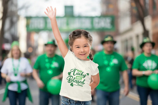 Toddler wearing Not Lucky Just Blessed tee with green shamrocks, White

