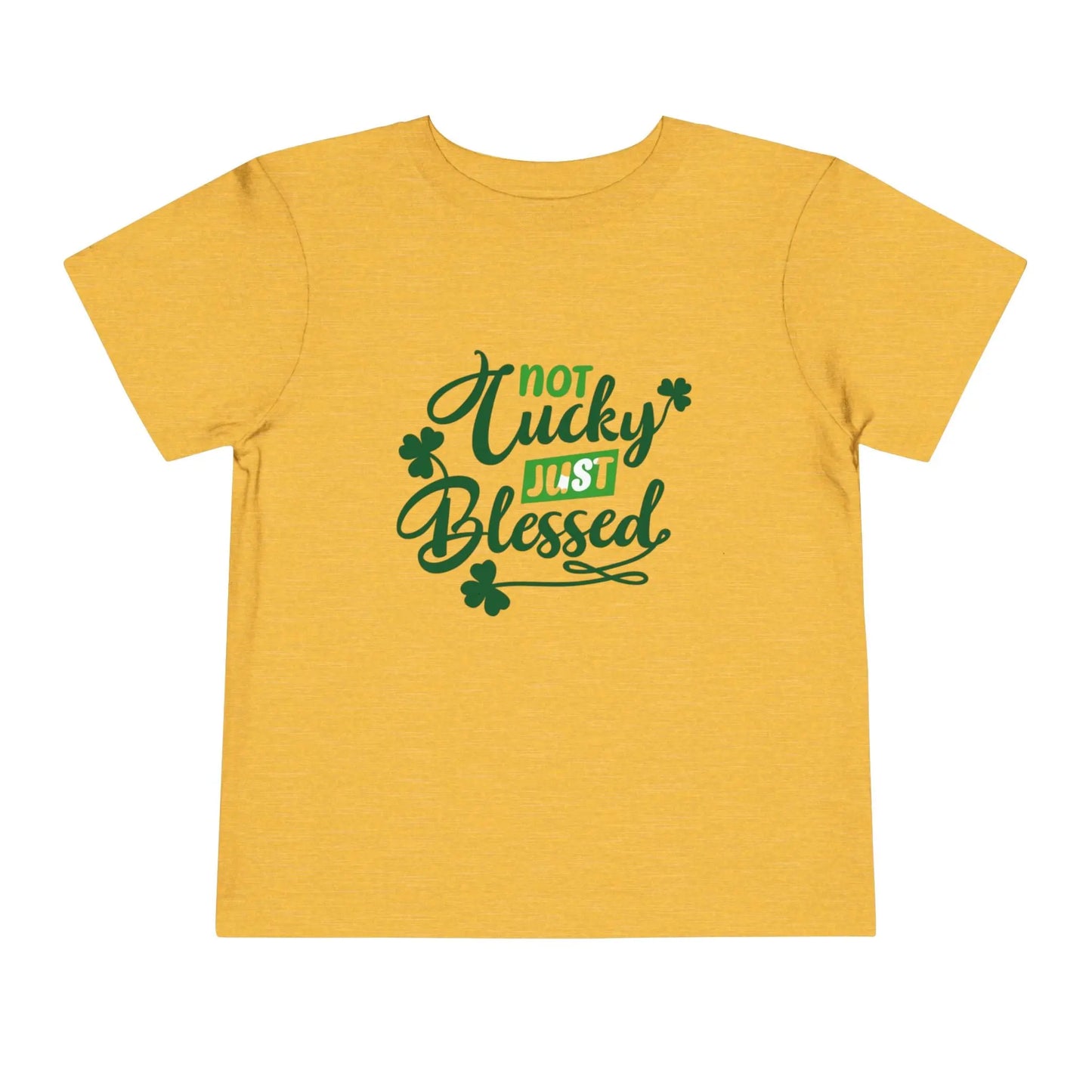 Soft cotton toddler tee with Not Lucky Just Blessed message and shamrocks. Perfect for faith-based St. Patrick's Day celebrations. Sizes 2T-5T. Heather Yellow Gold
