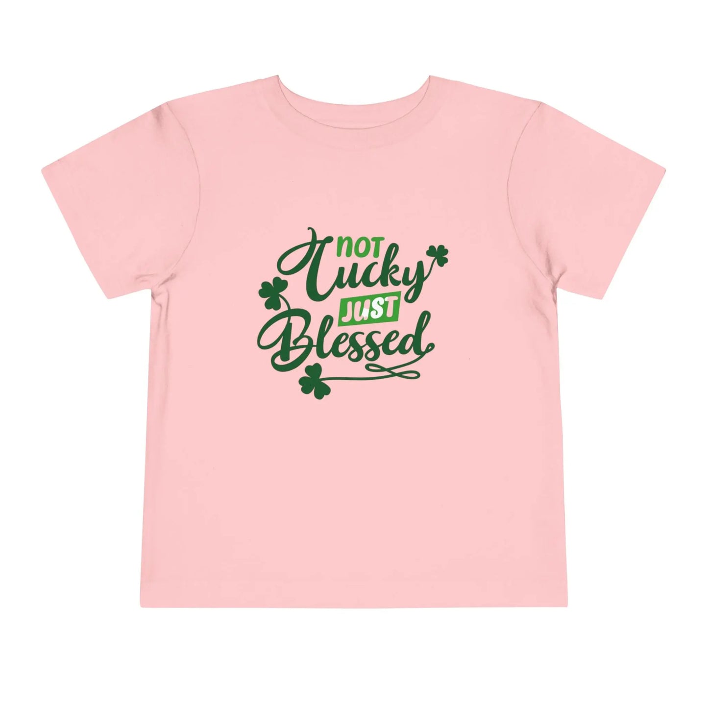Soft cotton toddler tee with Not Lucky Just Blessed message and shamrocks. Perfect for faith-based St. Patrick's Day celebrations. Sizes 2T-5T. Pink
