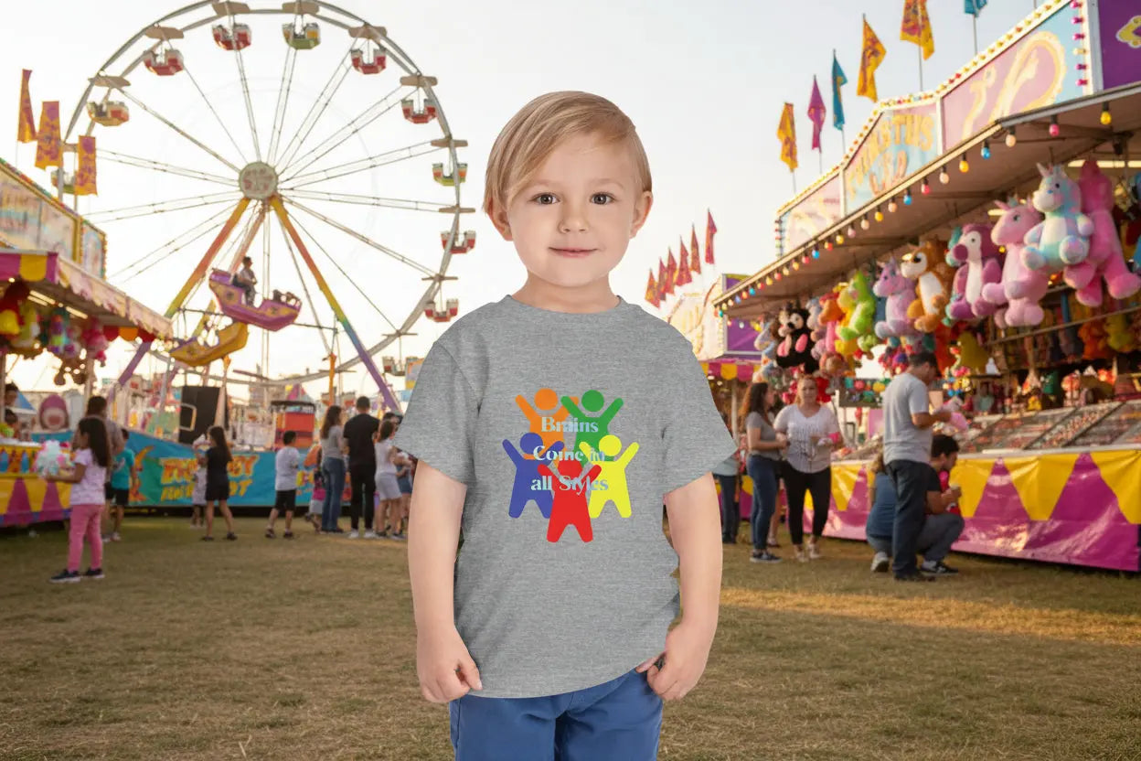 Toddler wearing rainbow diversity tee with colorful inclusive figures, Athletic Heather
