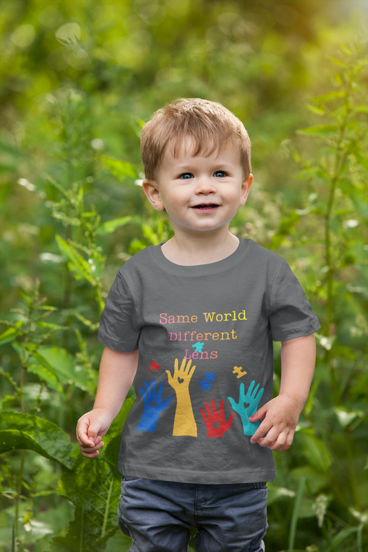 Toddler wearing Same World Different Lens tee with colorful handprints and autism awareness design, Asphalt
