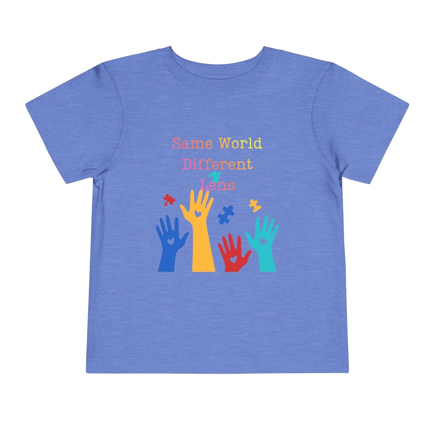 Soft cotton toddler tee with colorful hands, puzzle pieces, and Built Differently message. Celebrates neurodiversity and inclusion. Sizes 2T-5T. Heather Columbia Blue
