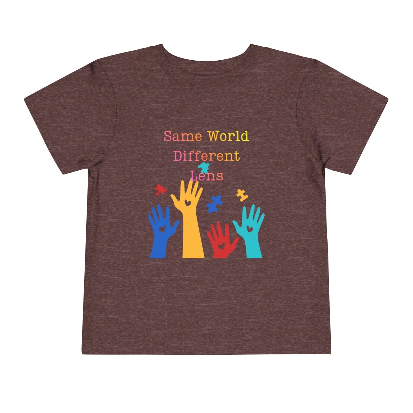 Soft cotton toddler tee with colorful hands, puzzle pieces, and Built Differently message. Celebrates neurodiversity and inclusion. Sizes 2T-5T. Heather Maroon
