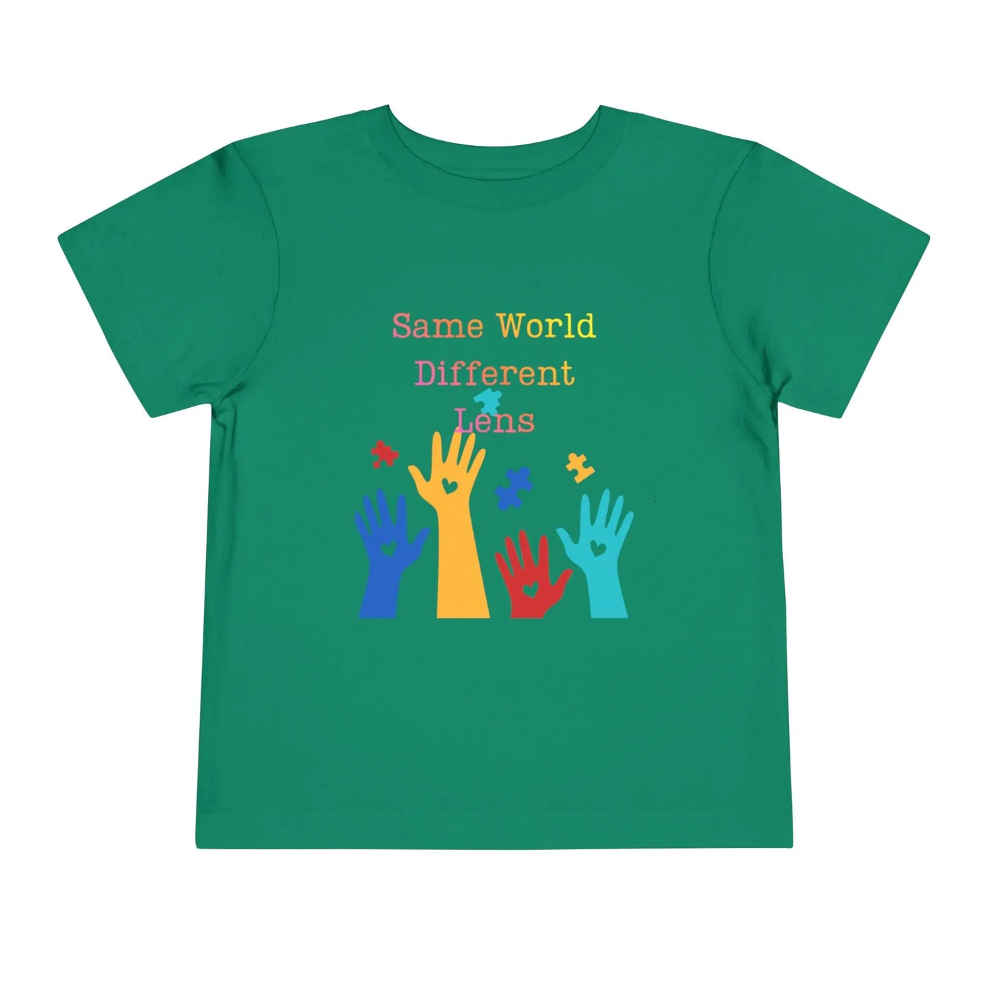 Soft cotton toddler tee with colorful hands, puzzle pieces, and Built Differently message. Celebrates neurodiversity and inclusion. Sizes 2T-5T. Kelly Green
