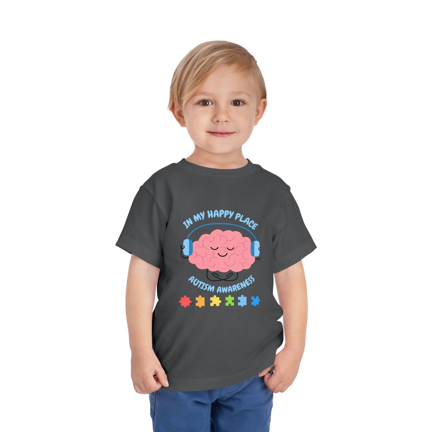 Child wearing a dark gray t-shirt with a brain graphic and text on a white background. Asphalt