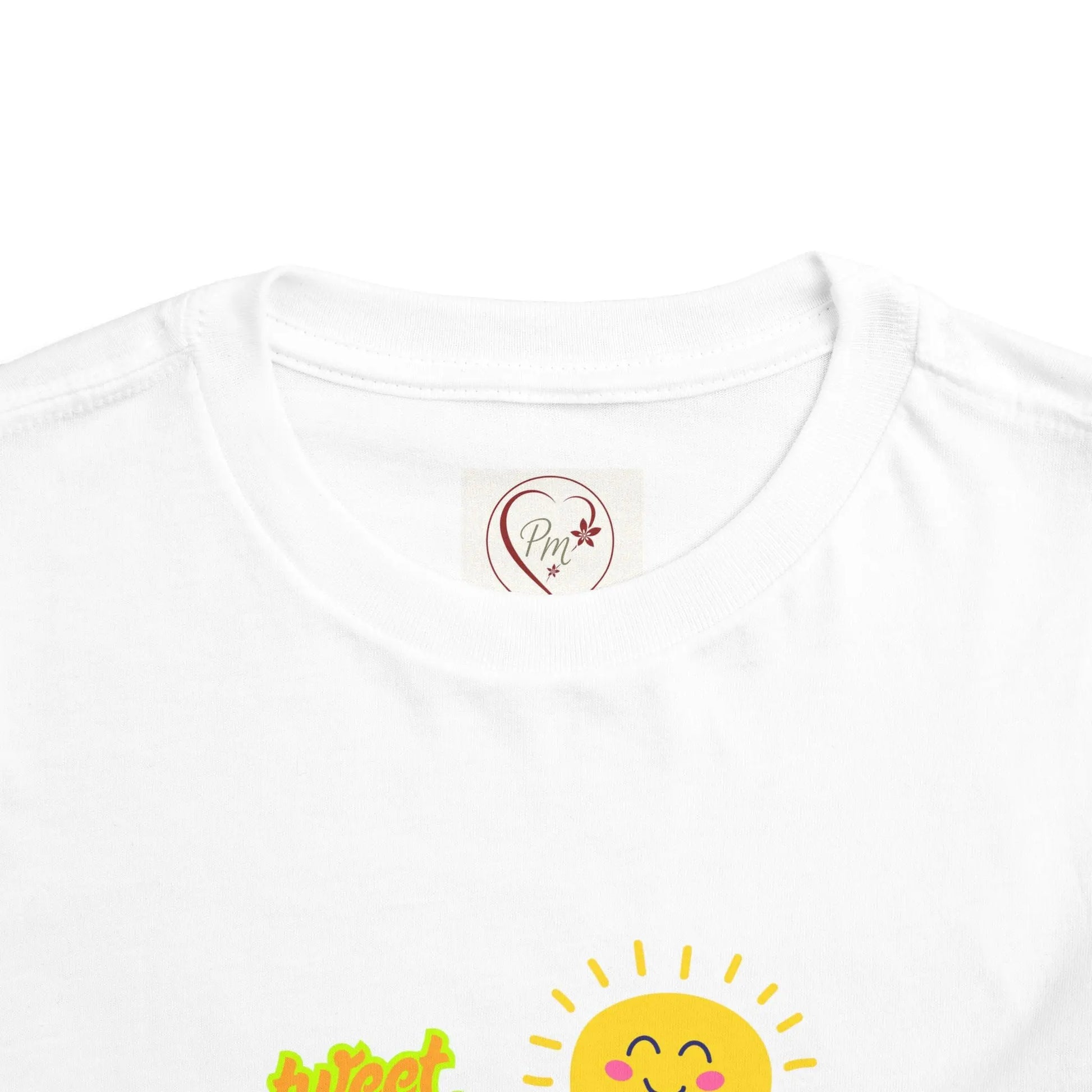 White t-shirt with a yellow sun graphic and text on a white background