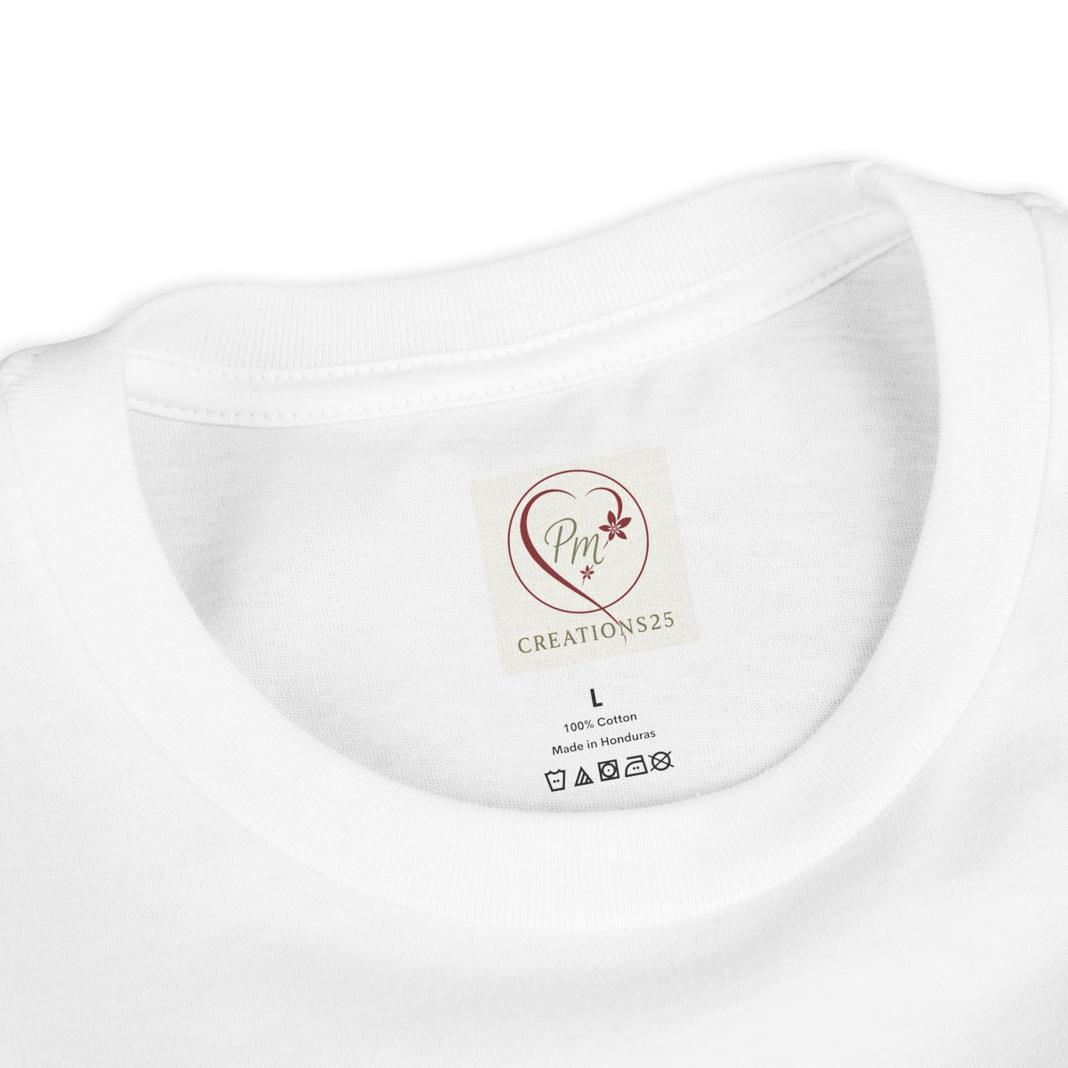 White t-shirt with a PM Creations 25 label on a white background