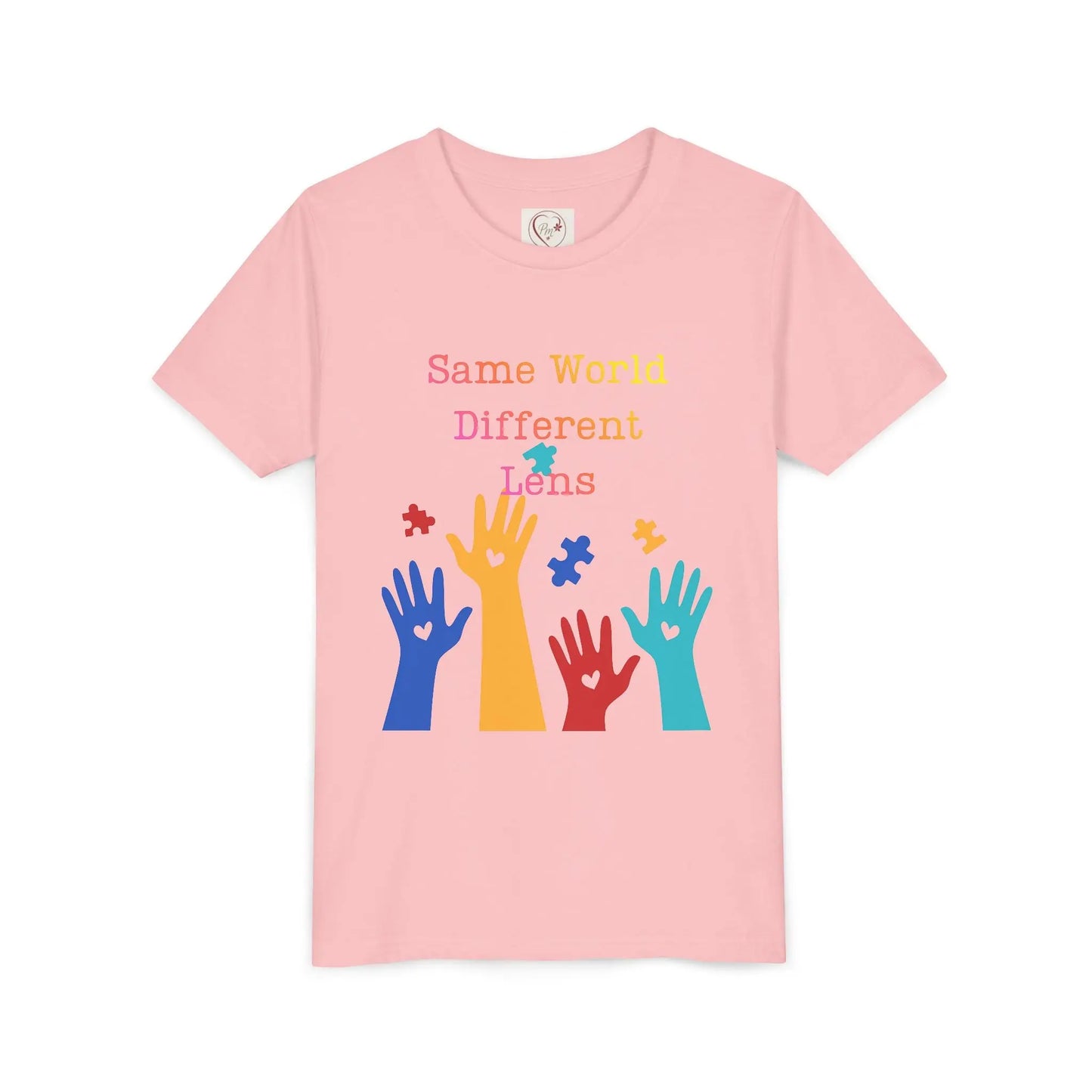 Soft cotton youth tee with colorful hands, puzzle pieces, and Built Differently message. Celebrates neurodiversity and inclusion. Sizes 2T-5T. Pink
